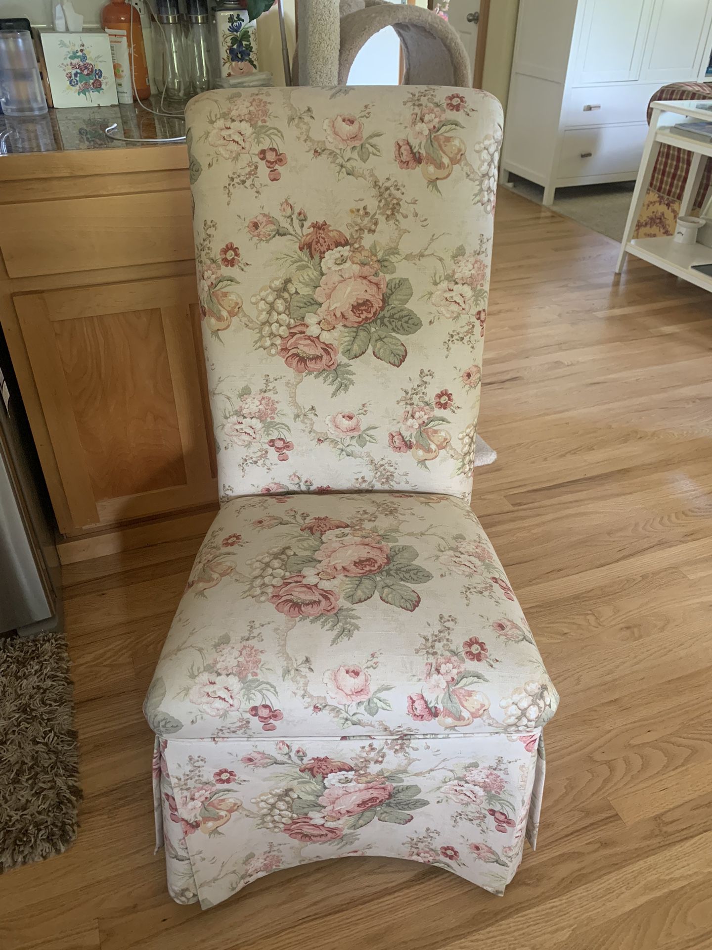 Custom Made Dining Chair with elegant roll back and a floor-length skirt 