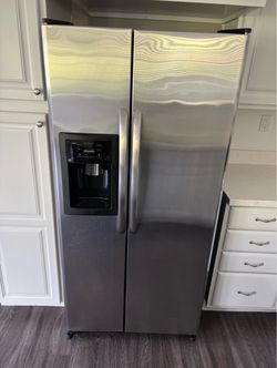 Refrigerator 20 cubic freezer fridge General Electric side by side stainless steel with water dispenser and ice maker (free local delivery) $400 firm