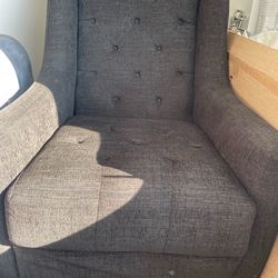 Black tufted arm chair