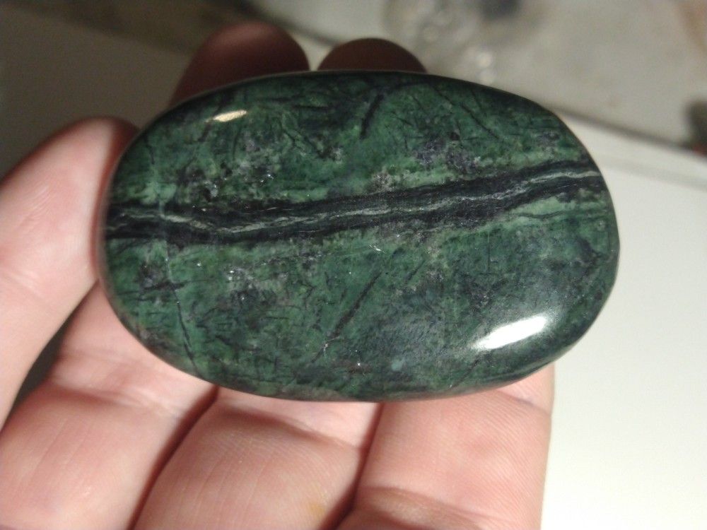 serpentine palm stone