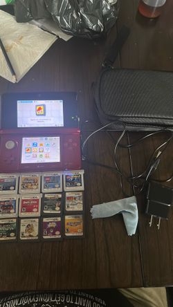 red nintendo 3ds with games (japanese version can use usa games)
