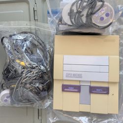 SNES Console With Controllers And Cables
