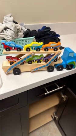 Melissa and Doug truck with cars