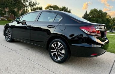$1,500 – Honda Civic EX • Sedan