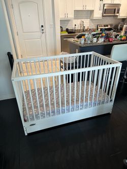 Baby crib , mattress ,covers and playground