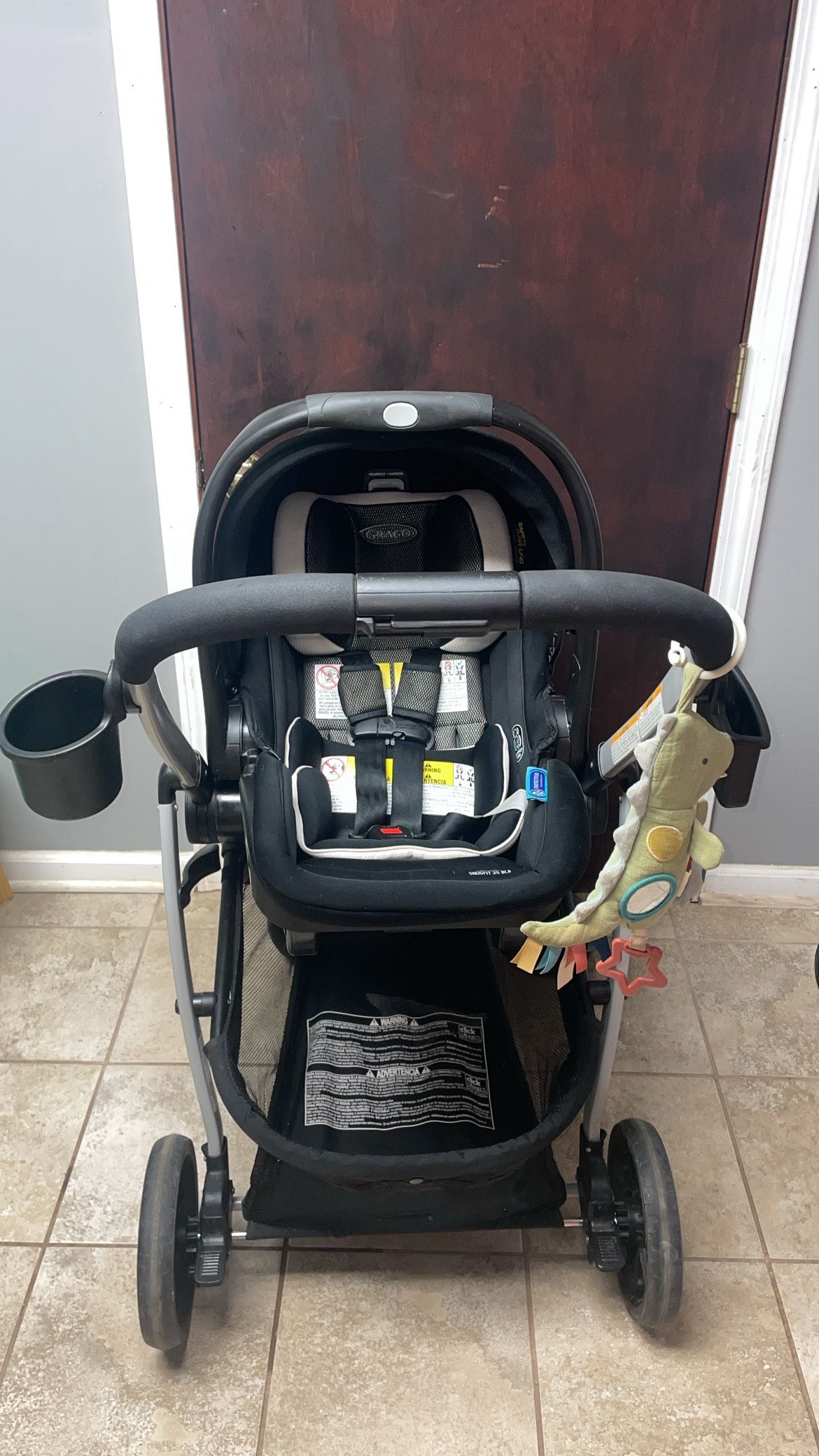 Graco SnugRide SnugFit DLX Infant Car Seat Featuring Safety Surround System