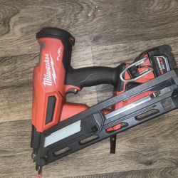 Milwaukee Nail Gun And Big Battery