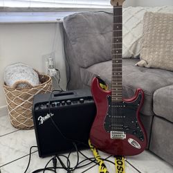electric guitar with amp