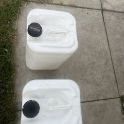 6 gallon plastic drum $15 each two for 25
