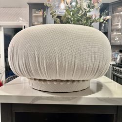 Large Vintage Swivel Pouf Ottoman Textured Boucle Like Cream Fabric w/a puff Pom Pom trim. Hollywood Regency J. Adler style Attr: to Adrian Pearsall