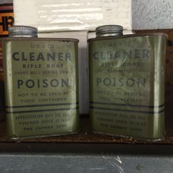 Two cans of U.S. WW II rifle bore cleaner