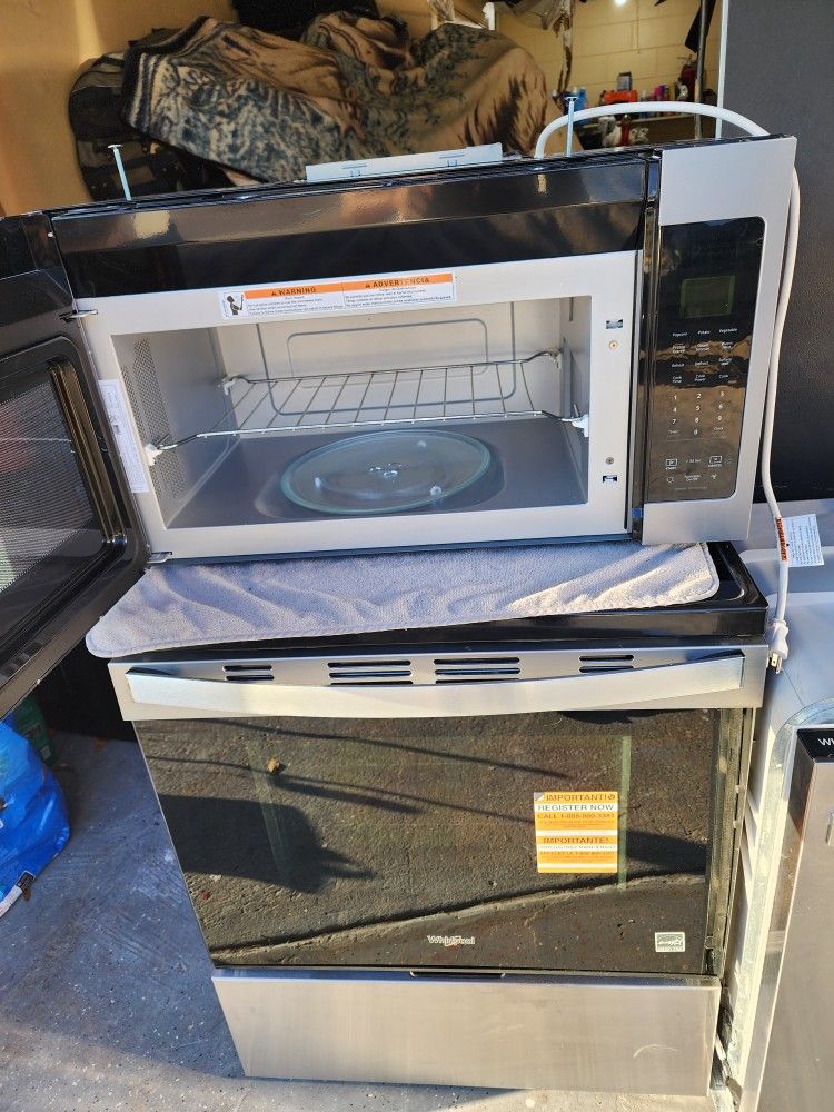 Set New Whirlpool Stove,Dishwasher And Microwave