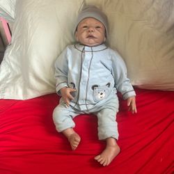 Hand Painted And weighted Reborn Baby. Rooted Hair. 