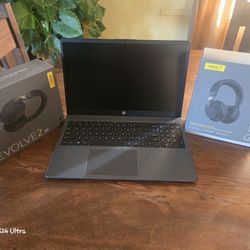 New PC And  2 Head Phones