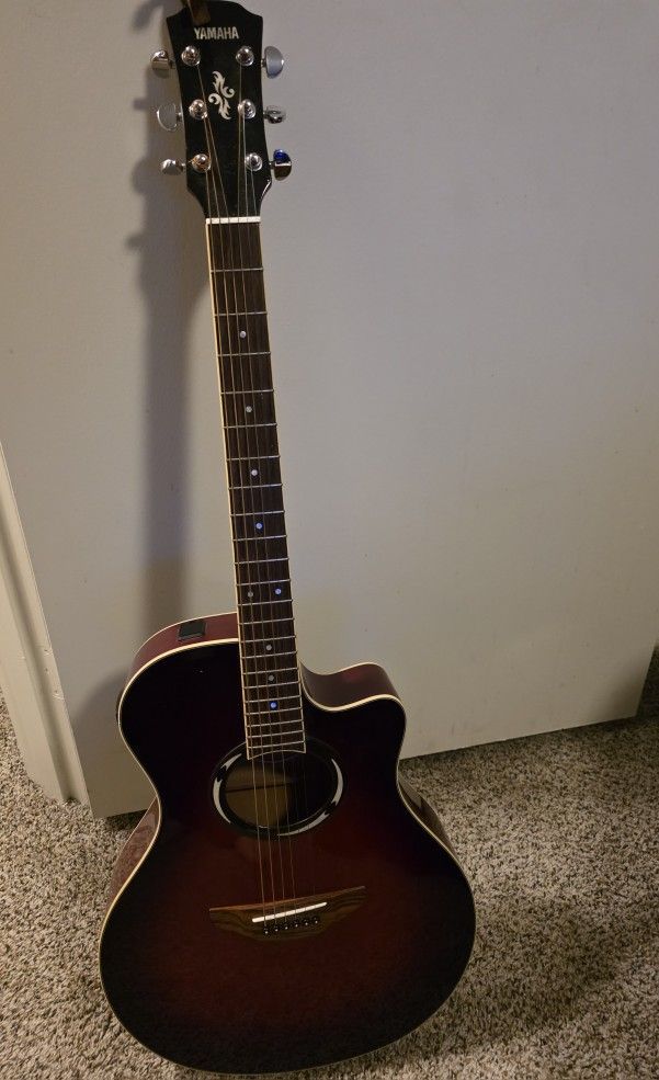 Acoustic Guitar With Capo
