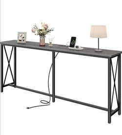 Behind couch table w oulets - $50