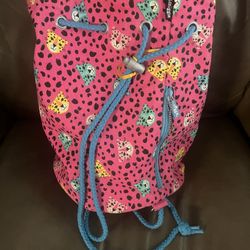 Smigel backpack with cheetahs