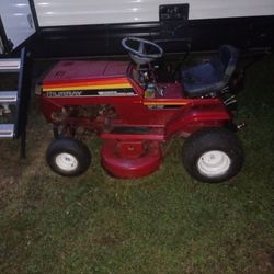 A Murray Lawn Mower Riding Lawn Mower With 12 Horsepower Briggs And Stratton Motor