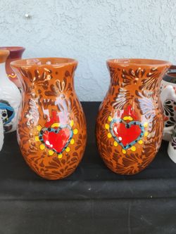 Floreros corazon de Jesus en oferta ($20) cada uno tel (contact info removed)