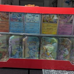 Prismatic Evolutions Mini 8-Tin Collection Box