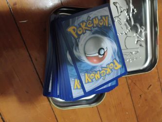 Tins + 50 cards of mega evolution era bulk