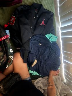 Nike sweater converse shorts and Jordan jacket and Ariana grande perfume