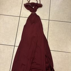 Long wine red dress with cutouts on the side
