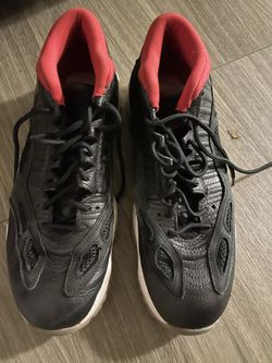 Jordan 11 Retro Low IE Black Varsity Red (2011)