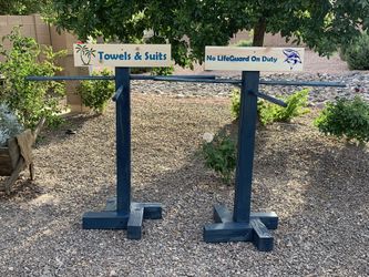 Pool towel drying racks