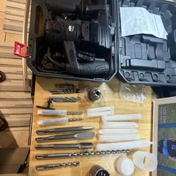 Rotary style hammer drill with bits and accessories new in box $120 in n Lakeland 
