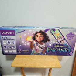 Scooter.   Encanto Kids Electric Scooter