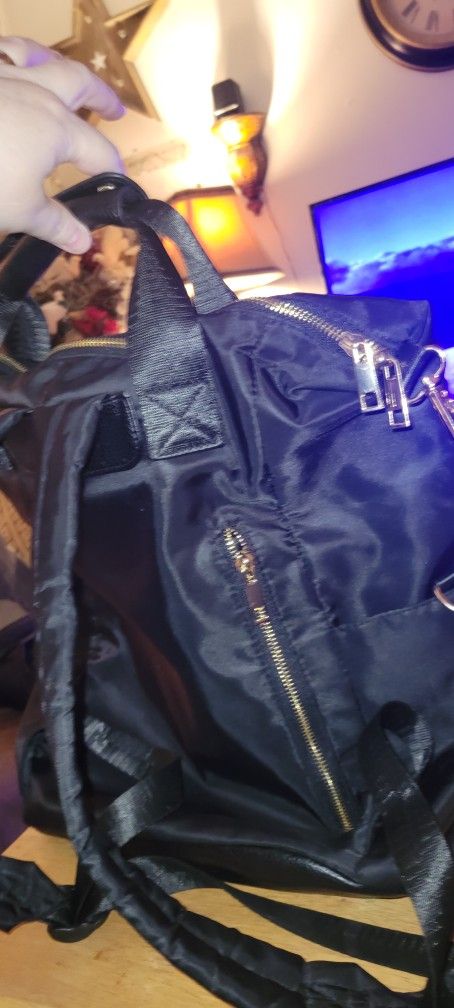 Black Purse Backpack