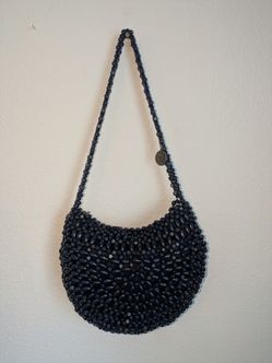 New The Sak Navy Blue Beaded Handbag.