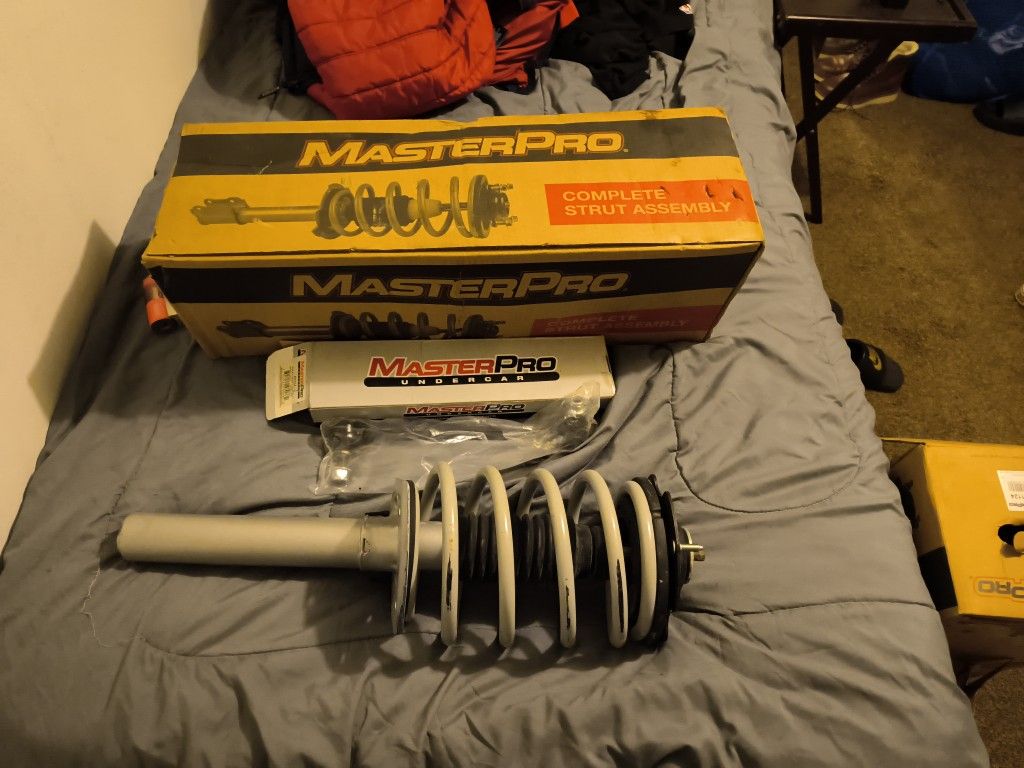 Front Passenger An Driver Side Struts/Shocks Assembly