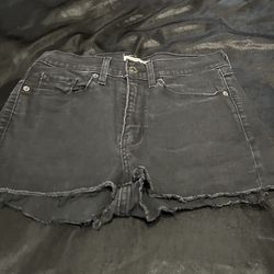women’s levi’s black jean shorts 28 in waist