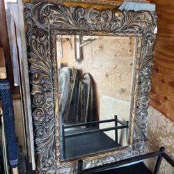 Ornate artist design golden solid wood  bevelled mirror 46 x 62.. $300
