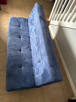 Blue velvet sofa bed