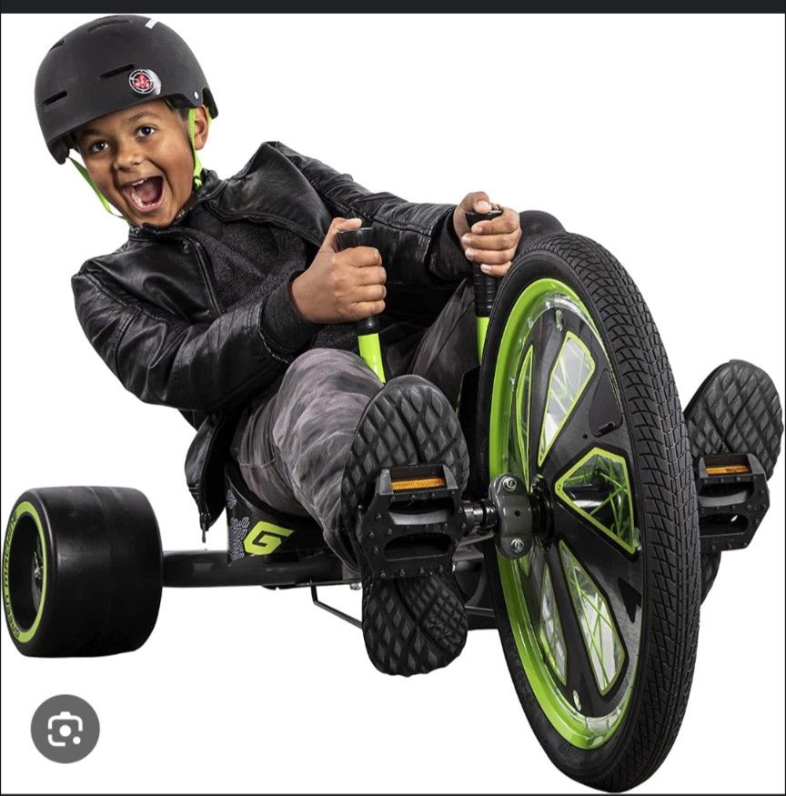 Huffy Green Machine RT20 inch 3 wheel tricycle in green and black.
