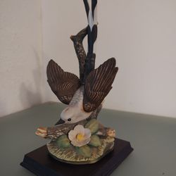 

Porcelain Bird Figurine