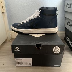 Blue and black converse