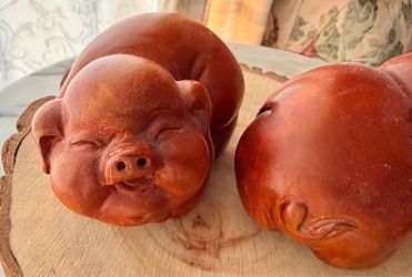 Vintage Hand-carved wooden pig figurines