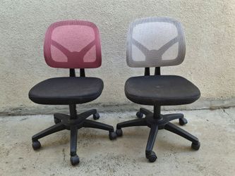2 computer chairs. Goes up and down & spins around  with good rolling wheels..