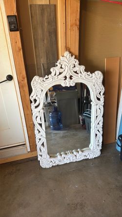 White framed mirror.