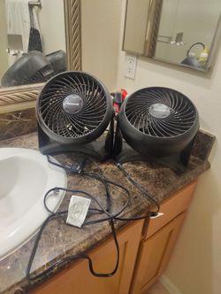 Two Honeywell Hangable, Floor Rotating Fans
