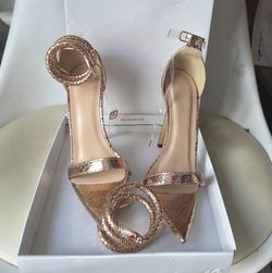 Gold high heels