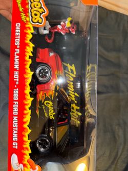 Jada Toys diecast model of a 1989 Ford Mustang GT themed after Flamin' Hot Cheetos
