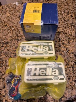 Hella 550 amber fog light kit . NEW