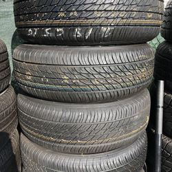 SET OF FOUR USED TIRES (DUNLOP /215/65/16)