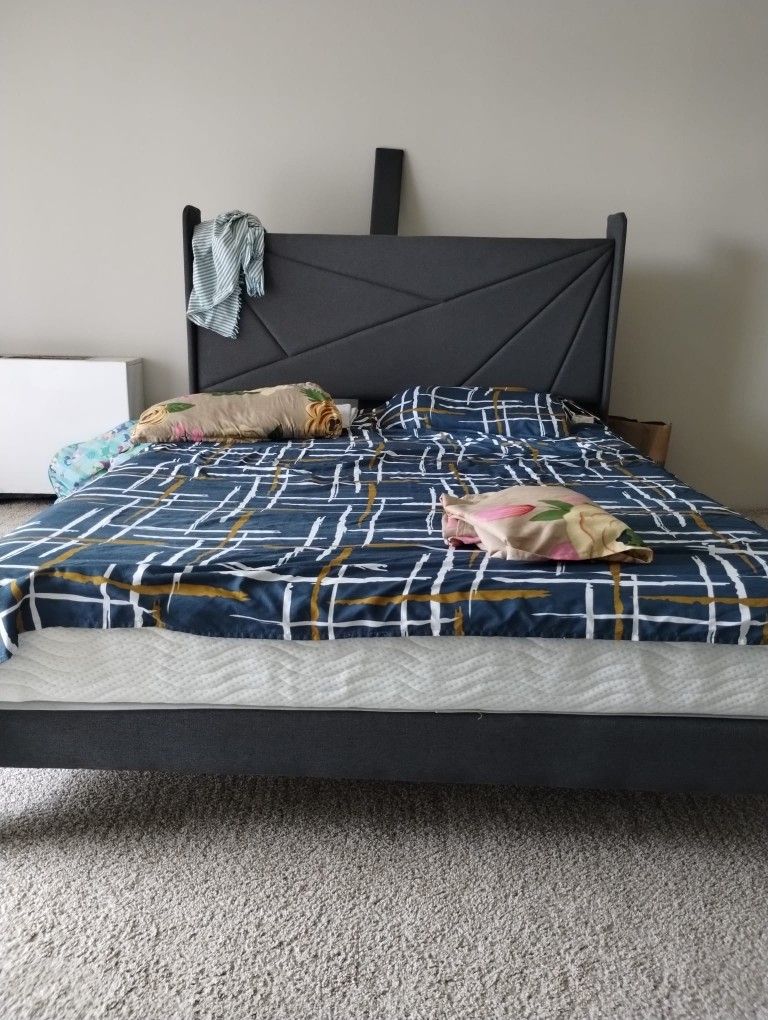 Queen size foam and spring bed with bed frame