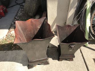 2 decorative trash cans